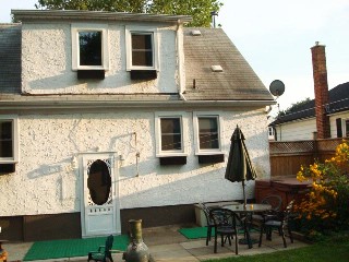 6387-maranda-view-of-back-of-house-and-hot-tub.jpg